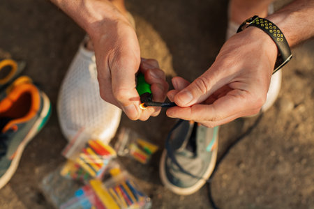A man repairs children's sneakers. Close-up of hands and sneakers. Shoemaker. Jack of all trades....