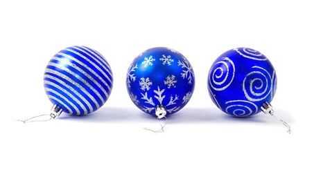 blue christmas balls isolated on whiteの写真素材