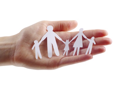 paper family in handsの写真素材