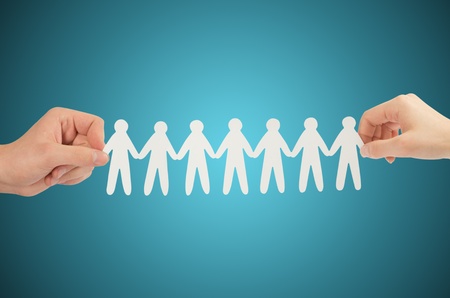 paper people in hands(man and woman)の写真素材