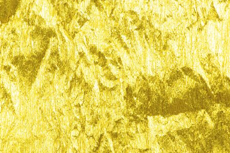 texture of golden foil close up viewの写真素材