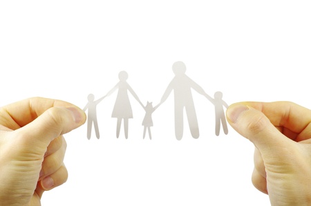 paper family in hands isolated on a white backgroundの写真素材