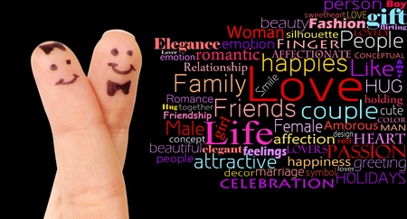 Painted couple of finger smiley isolated on black