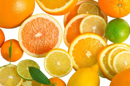 Vitamin C Overload, Stacks of sliced fruit isolated on whiteの写真素材