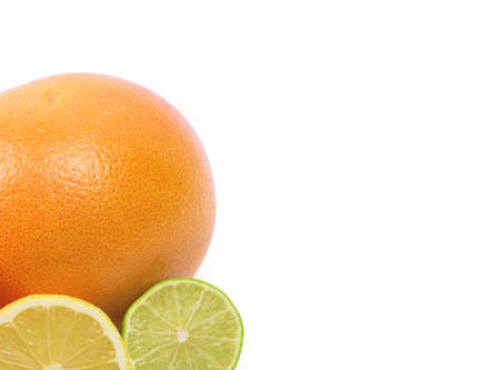 Image of a fresh whole lime, lemon and orange isolated on white