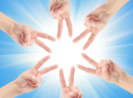 Hands of teamwork , forming the star shapeの写真素材