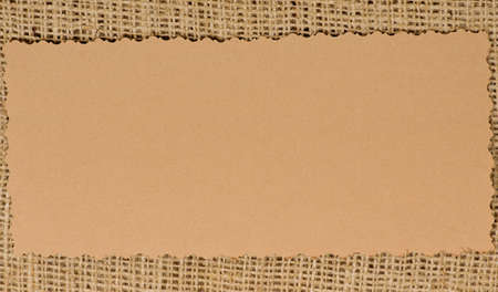 Old paper tag on natural burlapの写真素材