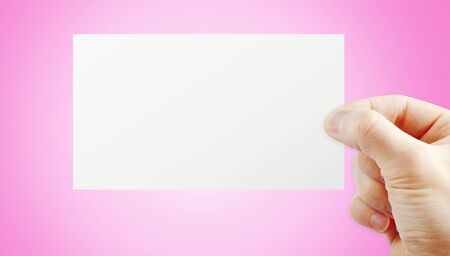 Hand holding paperの写真素材