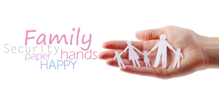 Paper family in hands isolated on white backgroundの写真素材