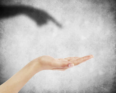 Hand on wall backgroundの写真素材