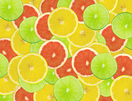 Abstract background of citrus slices. Closeup. Studio photography.の写真素材