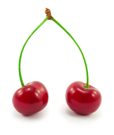 sweet cherries isolated on a white backgroundの写真素材