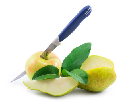 apple and pear with a knife isolated on white backgroundの写真素材