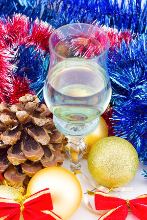 glass of champagne with Christmas decorationsの写真素材