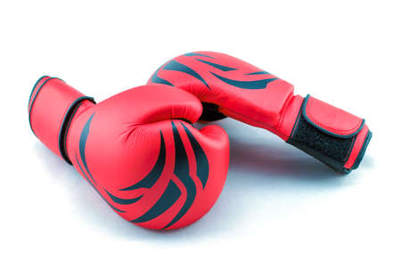 red boxing gloves on a white backgroundの写真素材