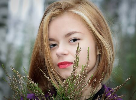 young beautiful girl with red hairの写真素材