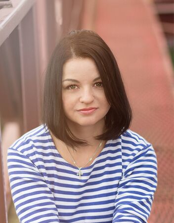 portrait of young woman on natureの写真素材