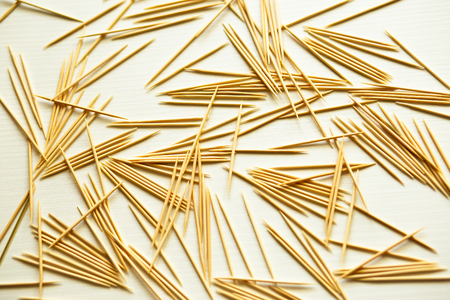 wooden toothpicks on white backgroundの写真素材