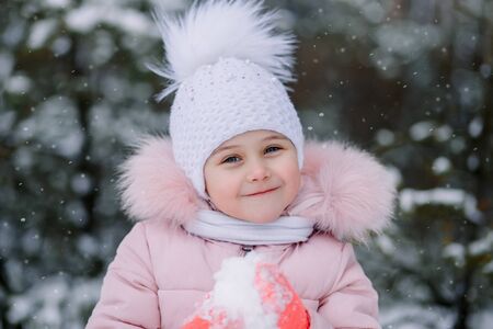 little cute girl winter portrait in natureの写真素材