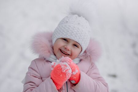 little cute girl winter portrait in natureの写真素材