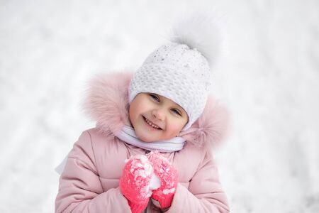 little cute girl winter portrait in natureの写真素材