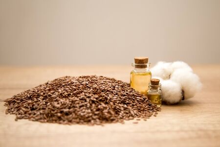 linseed oil and many flax seedsの写真素材