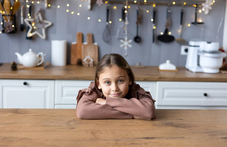 Close up headshot portrait of smiling little school girl. Virtual event concept.の写真素材