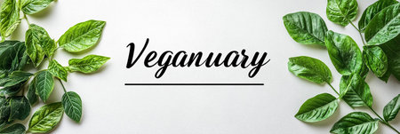 Banner with leaves with the inscription Veganuary. Vegan lifestyleの素材