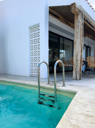 Pool at the villa near the ocean in the resort town. Summer holidays and travelの写真素材
