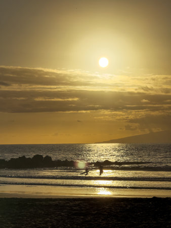 colorful sunset on the ocean coast. Romantic atmosphere and end of the dayの写真素材