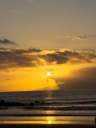 colorful sunset on the ocean coast. Romantic atmosphere and end of the dayの写真素材