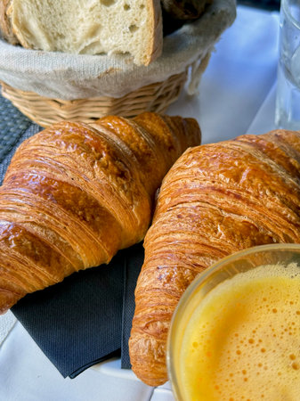 French breakfast at a cafe - croissants and orange juiceの写真素材