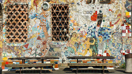 Ljubljana, Slovenia - 07 19 2015 - Art wall in Metelkova, artistic district with colored buildings, graffitti, sculptures and mosaics, sunny dayのeditorial素材