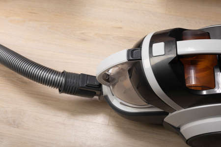 Cleaning with vacuum cleaner. Appliances for cleaning house. Household chores or cleaning companyの写真素材