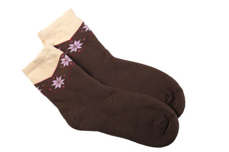 Warm and cozy brown terry socks isolated on white background