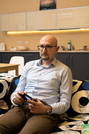 30-year-old gamer man playing video games. online game. technology, gaming, entertainment concept