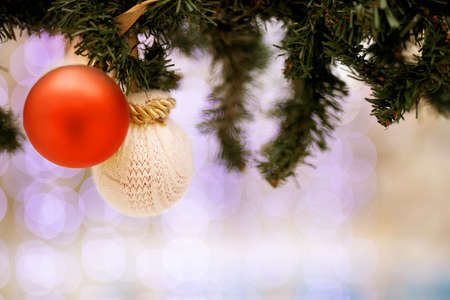 Christmas balls as decoration with artificial spruce on bokeh background. Copy space. place for your...