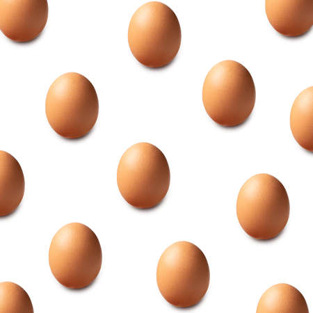 Pattern background with brown chicken eggs isolated on white background cutout.