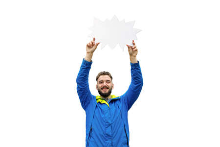 Smiling young man holding empty blank board isolated on white background. Your text hereの写真素材