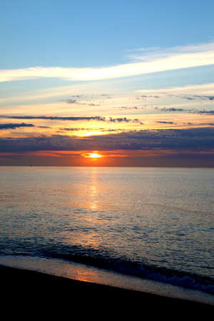Early colorful sunrise on the sea beachの写真素材