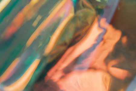 Abstract blurred multicolored, yellow-green, holographic background, backdropの写真素材