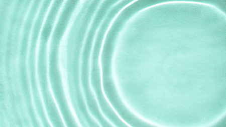 Abstract nature textured background, water waves in the pool with sun reflection, clear blue water,...