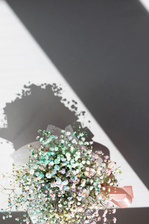 Bouquet of dry multicolored flowers close-up on a grey background. Background, pattern. Top viewの写真素材