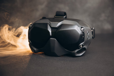 Close-up of black virtual reality glasses on a dark concrete background. Glasses for controlling drones. Front viewの写真素材