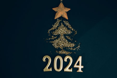 New Year, Christmas background. Candle numbers 2024 in silver and gold on a black background with golden sequins. Top viewの写真素材