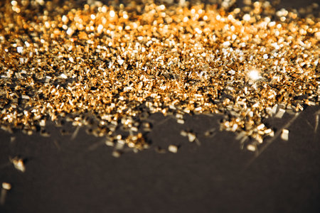 Abstract background of blurred yellow lights for design. Lights bokeh dis focus. Christmas background, copy spaceの写真素材