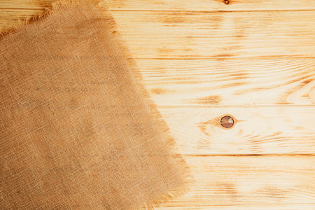 Brown textured wooden background, burnt wood. Background of yellow wooden boards for design with a...
