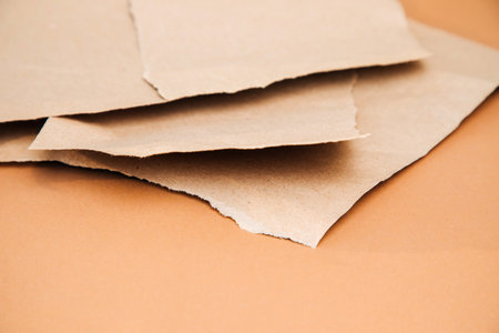 Packaging of eco-materials. Packaging paper on a brown background. Concept saving the planet from undetectable debris. Top viewの写真素材