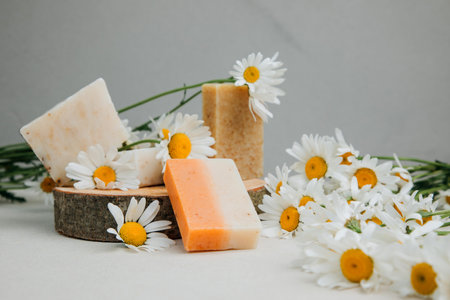 Handmade soap from natural ingredients, various herbs, chamomile. Concept of sustainable use, bath...