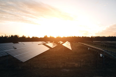 Large panels of sleepy batteries outside. Alternative electricity, green economy. Background with...